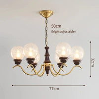 Lustre de Luxe en cuivre avec LED, idéal pour illuminer votre salon, votre chambre ou votre salle à manger | Marco Lucetti 6 têtes transparentes