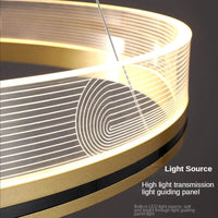 Lustre de luxe italien moderne en acrylique avec anneau lumineux créatif et design minimaliste | Marco Lucetti