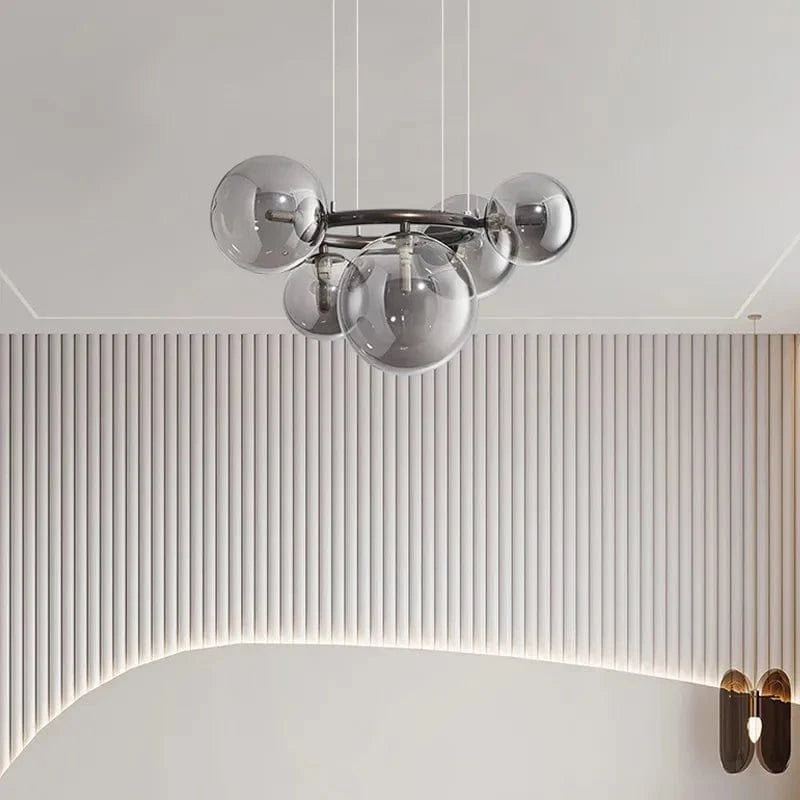 Lustre de verre et métal en boule et barre design | Marco Lucetti