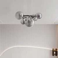 Lustre de verre et métal en boule et barre design | Marco Lucetti