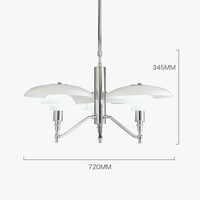 Lustre design danois à branches chromées. | Marco Lucetti