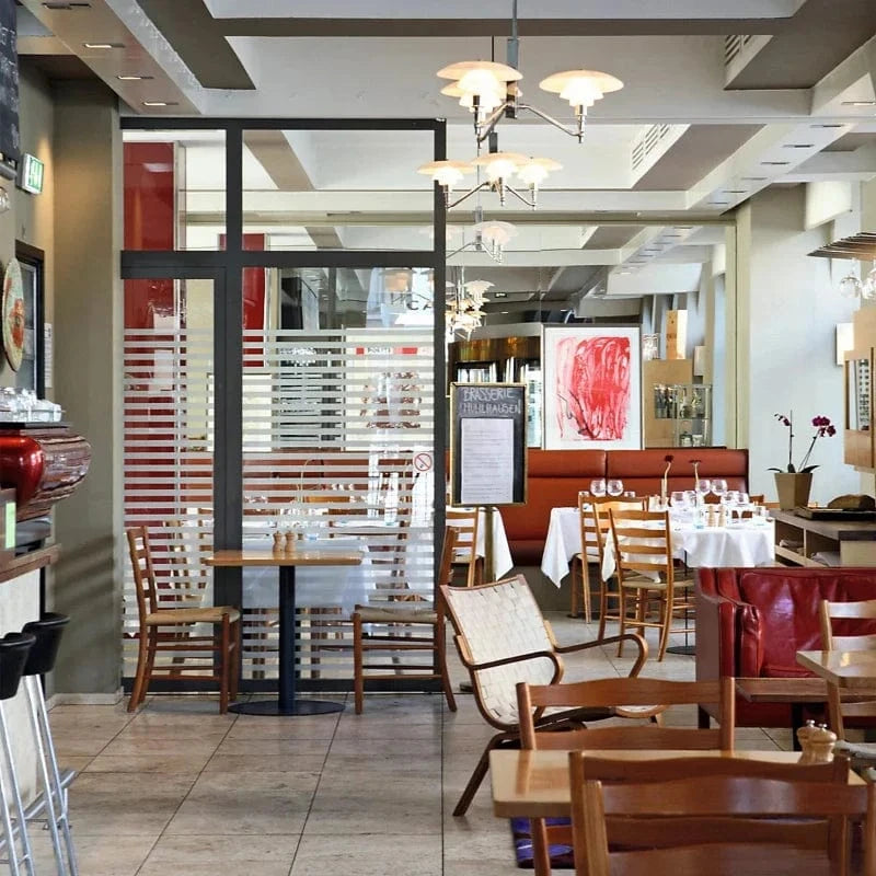 Lustre design danois à branches chromées. | Marco Lucetti