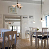 Lustre design danois à branches chromées. | Marco Lucetti