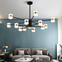 Lustre design LED en métal noir et lampes rose gold de chez Fly. | Marco Lucetti