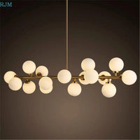 Lustre Design Métal Doré avec Lampes Boules | Marco Lucetti