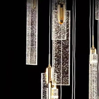 Lustre design Nordique - Suspensions dorées tombantes | Marco Lucetti