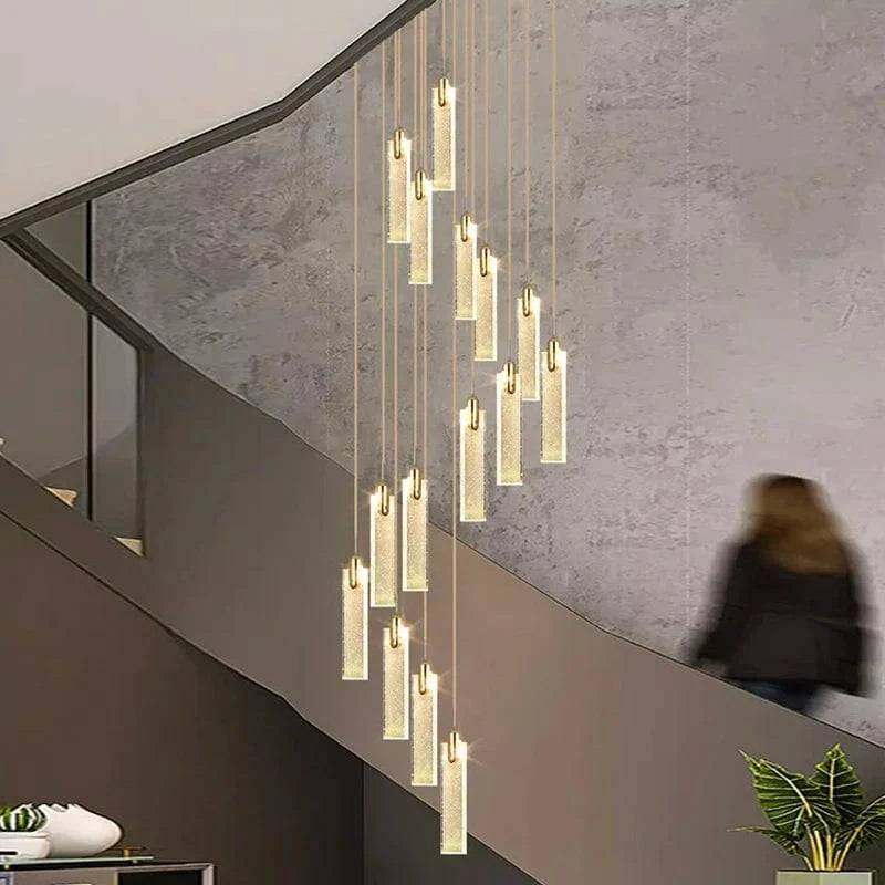 Lustre design Nordique - Suspensions dorées tombantes | Marco Lucetti