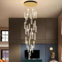 Lustre design Nordique - Suspensions dorées tombantes | Marco Lucetti