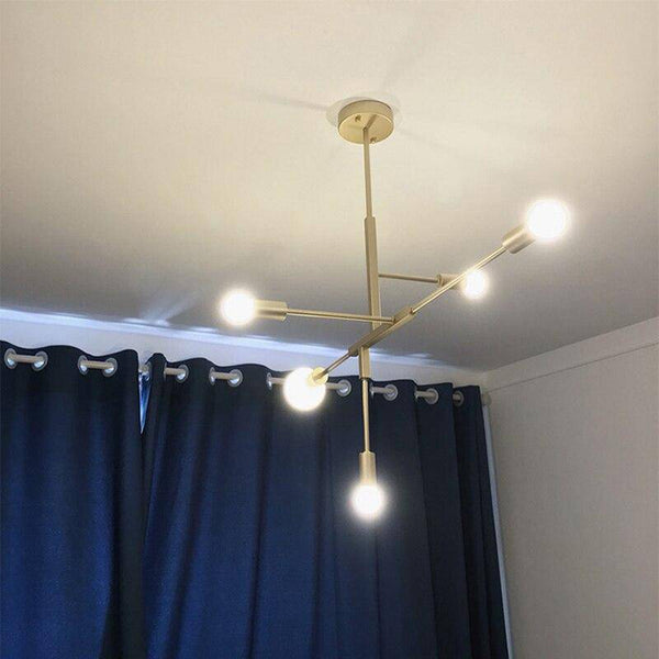 Lustre doré - Créativité en design | Marco Lucetti