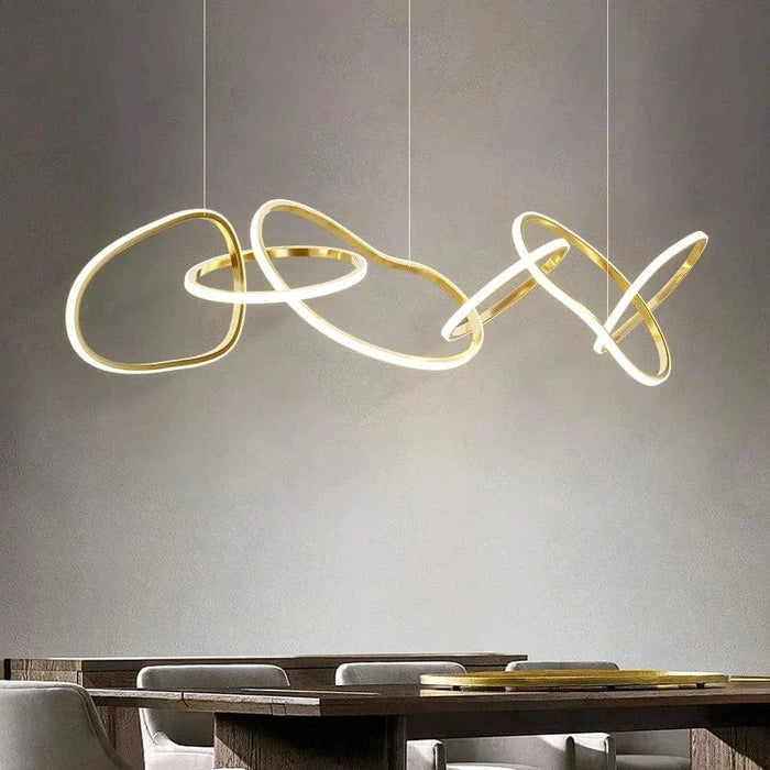 Lustre doré vintage pour éclairer votre salle à manger | Marco Lucetti