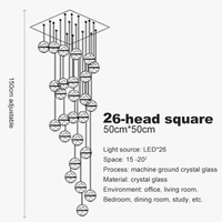 Lustre en cristal moderne avec boule tournante LED suspendue - LUXE LUMINEUX | Marco Lucetti