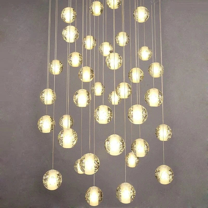 Lustre en cristal moderne avec boule tournante LED suspendue - LUXE LUMINEUX | Marco Lucetti
