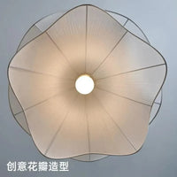 Lustre en tissu plissé nordique : simplicité et confort | Marco Lucetti