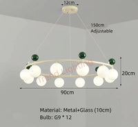 Lustre en verre et métal à la pointe du design pour un éclairage dynamique | Marco Lucetti A-12 Balles-Vert / Lumière naturelle