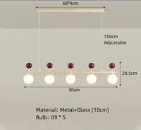Lustre en verre et métal à la pointe du design pour un éclairage dynamique | Marco Lucetti B-5 Balles-Rouge / Blanc chaud