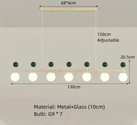 Lustre en verre et métal à la pointe du design pour un éclairage dynamique | Marco Lucetti B-7 Balles-Vert / Lumière naturelle