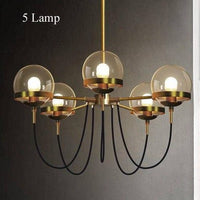 Lustre industriel doré avec boule en verre | Marco Lucetti 5 lampes