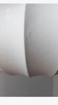 Lustre japonais en soie pour une salle à manger au style Wabi-sabi | Marco Lucetti