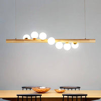 Lustre LED en bois scandinave à sphères multiples | Marco Lucetti