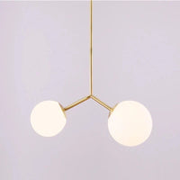 Lustre Magique en Boule de Verre aux Haricots Lumineux | Marco Lucetti