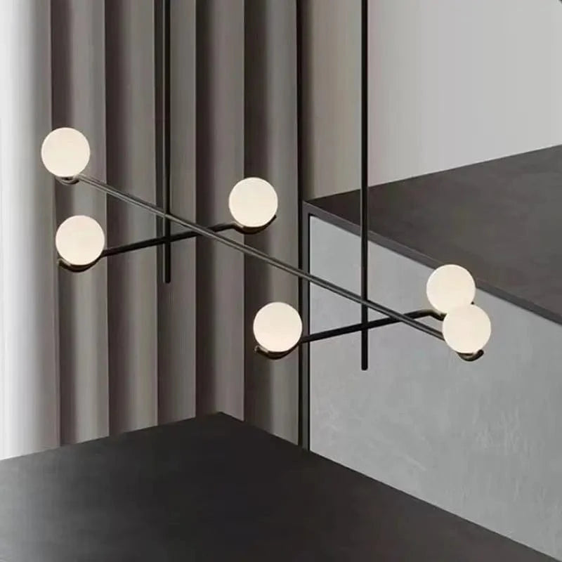 Lustre minimaliste boule de verre Luces à LED pour un éclairage élégant et moderne dans votre intérieur | Marco Lucetti