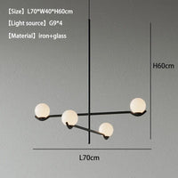 Lustre minimaliste boule de verre Luces à LED pour un éclairage élégant et moderne dans votre intérieur | Marco Lucetti Noir 4 têtes / Changeable