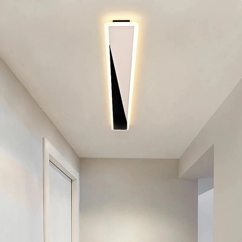 Lustre Minimaliste Nordique avec Bande Longue et Touche Créative | Marco Lucetti