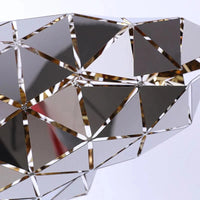 Lustre moderne en acier inoxydable pour une décoration lumineuse. | Marco Lucetti