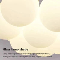 Lustre moderne en verre avec boules blanches LED | Marco Lucetti