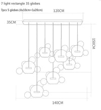 Lustre moderne en verre laiteux avec LED suspendue. | Marco Lucetti 7 lumières droites