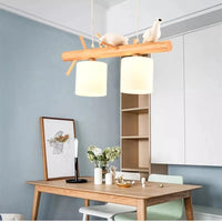 Lustre nordique en bois massif avec motifs d'oiseaux nordiques | Marco Lucetti