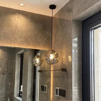 Lustre nordique en verre lave glace à la forme créative et rétro. | Marco Lucetti