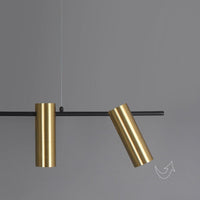 Lustre Prism doré minimaliste. | Marco Lucetti