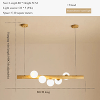 Lustre suspendu en bois massif et boules de verre blanc lait - Design Luxe | Marco Lucetti