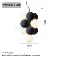 Lustre Suspendu Haut de Gamme pour Hôtels et Restaurants | Marco Lucetti Noir vertical / Lumière blanche