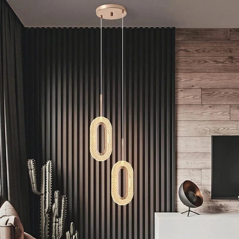 Lustre suspendu nordique moderne en acrylique doré à LED | Marco Lucetti