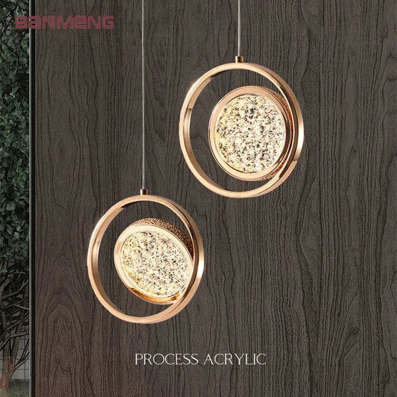 Lustre suspendu nordique moderne en acrylique doré à LED | Marco Lucetti