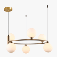 Lustre suspendu SANDYHA nordique noir et or, boule de verre en métal, LED intégrée - Pour salle à manger et salon | Marco Lucetti