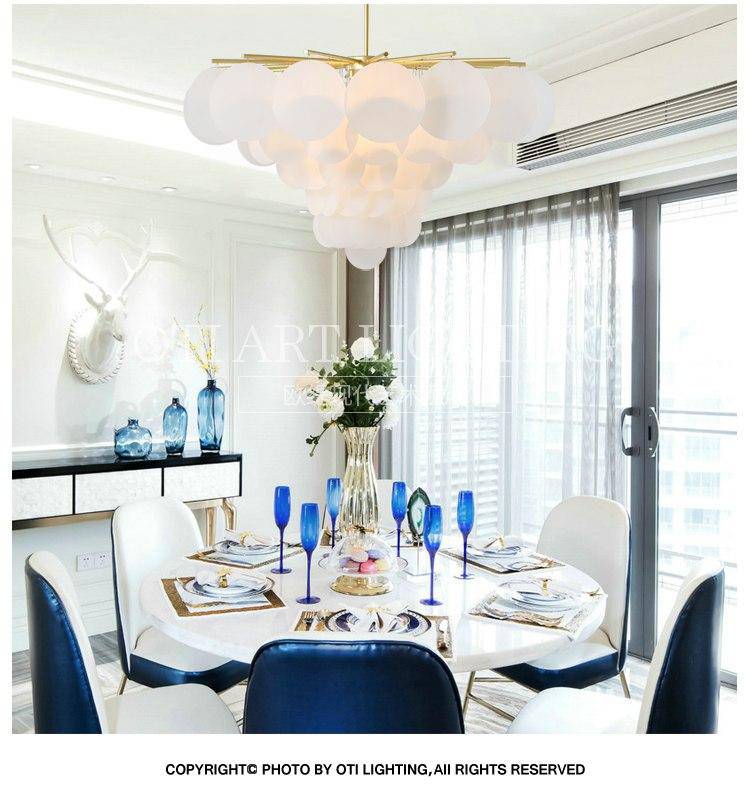 Lustre Vertigo en or et verre design | Marco Lucetti