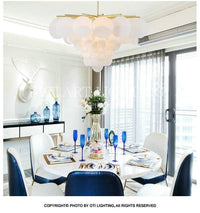 Lustre Vertigo en or et verre design | Marco Lucetti