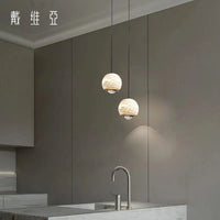 Lustres en marbre élégants pour une salle à manger contemporaine | Marco Lucetti