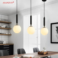 Moderne Luminaires LED Boule de Verre Noir/Or pour Cuisine et Salle à Manger | Marco Lucetti
