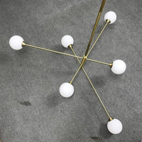 Nordic Luxe : Lustre en Verre et Laiton pour Déco Intérieur - Suspension Élégante  | Marco Lucetti