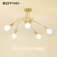 Plafonnier doré CrossBranch. | Marco Lucetti