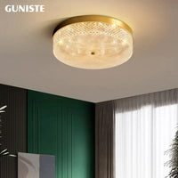 Plafonnier doré métallique rond | Marco Lucetti