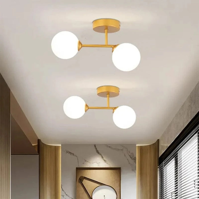 Plafonnier en verre noir et or moderne pour éclairer votre intérieur | Marco Lucetti