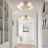 Plafonnier moderne en fer forgé | Lampe de porche avec abat-jour sphérique en verre blanc | Marco Lucetti