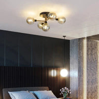 Plafonnier moderne en verre LED pour un salon design | Marco Lucetti