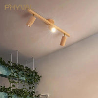 Plafonnier projecteurs spots sur rail LED nordique pour salon - Eclairage de magasin en bois | Marco Lucetti