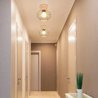 Plafonnier rétro en métal pour intérieur d'allée, avec cage en fer et corde de chanvre | Marco Lucetti